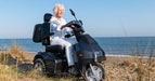 AFIKIM Dark Grey Afiscooter S3 Outdoor Mobility Scooter On Seaside Terrain