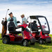 AFIKIM Red Afiscooter S4 Standard Mobility Scooter On Terrain With And Without Canopy View