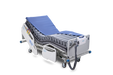 APEX Medical Wellell Domus 3 Alternating Pressure Mattress In Bed Frame Half Covered With Air Pump View