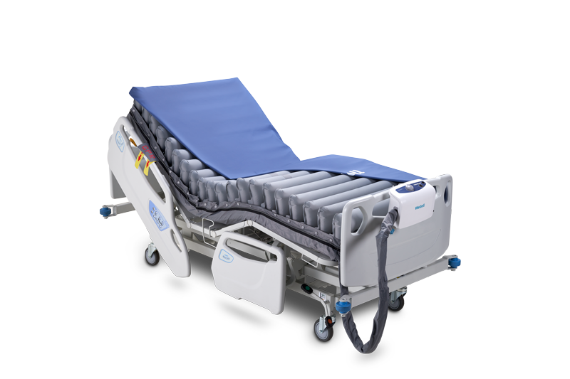 APEX Medical Wellell Domus 3 Alternating Pressure Mattress In Bed Frame Half Covered With Air Pump View
