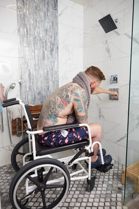Altimate Medical ActiveAid 600 Mobile Rehab Commode Chair Side Perspective Showing A User In A Walk-In Shower For Safe And Accessible Personal Care.