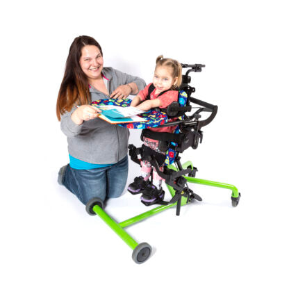 Altimate Medical EasyStand Bantam Extra Small Green In Use With Carer Front Side View For Assisted Standing