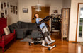Altimate Medical EasyStand Bantam Medium White Supine Ready Stander With User In Slanted Standing Position Front Side View