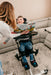 Altimate Medical EasyStand Bantam Small Stander With User Standing And Mother During Reading Activity