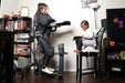 Altimate Medical EasyStand Evolv Large Stander Upright Position With User And Younger Brother Engaged In Reading Activity