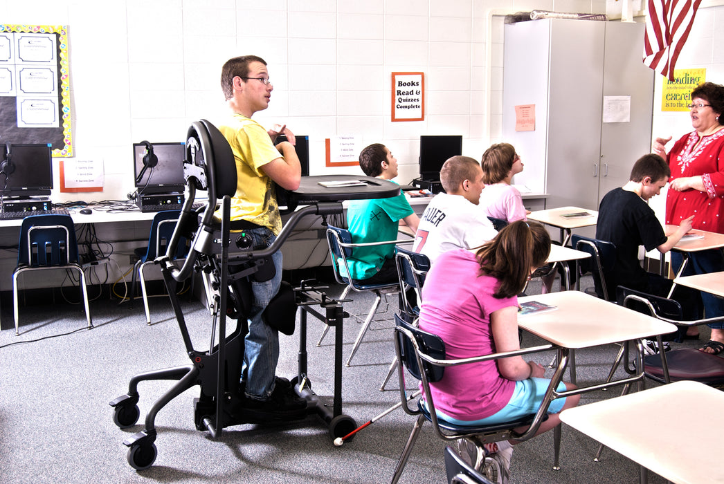 Altimate Medical EasyStand Evolv Medium Stander Upright Position With User In Classroom For Inclusive Education