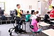 Altimate Medical EasyStand Evolv Medium Stander Upright Position With User In Classroom For Inclusive Education