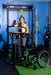 Altimate Medical EasyStand Glider Large Active Standing Frame for Mobility, Support & Full-Body Range of Motion with a Person Using it inside a Gym