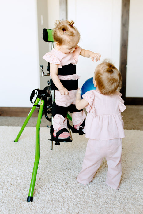Altimate Medical Zing Portable Early-Intervention Pediatric Stander Lightweight, Foldable Standing Support for Infants and Young Children with another toddler