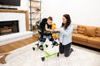 Altimate Medical Zing Supine Size 1 Pediatric Standing Frame Adjustable Supine-to-Vertical Positioning with an Adult inside the LIving Room