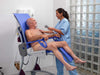 Arjo Carino Shower And Hygiene Chair With Patient And Caregiver Giving Bath View