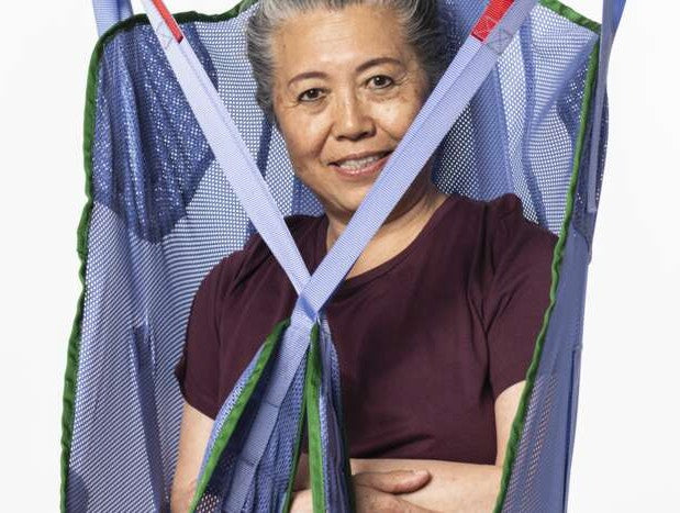 Close Up Front View Of Arjo Loop Bathing Sling Unpadded Legs In Use Showing Material Texture