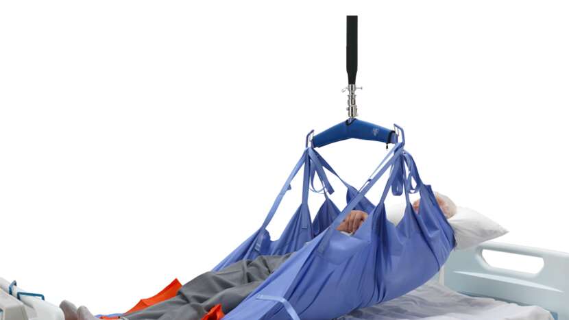 Arjo Loop Repositioning Sling On Patient Attached To Lift, Close-Up View.