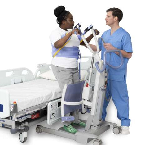 Arjo Sara Flex Standing Sling In Use By Patient With Carer Providing Sit To Stand Transfer