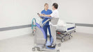 Arjo Sara Plus Sit to Stand With Patient And Caregiver Holding Hand Control View