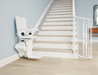 Atlas Liberty Straight Stairlift Installed On The Right Side Of A Staircase Viewed From The Bottom