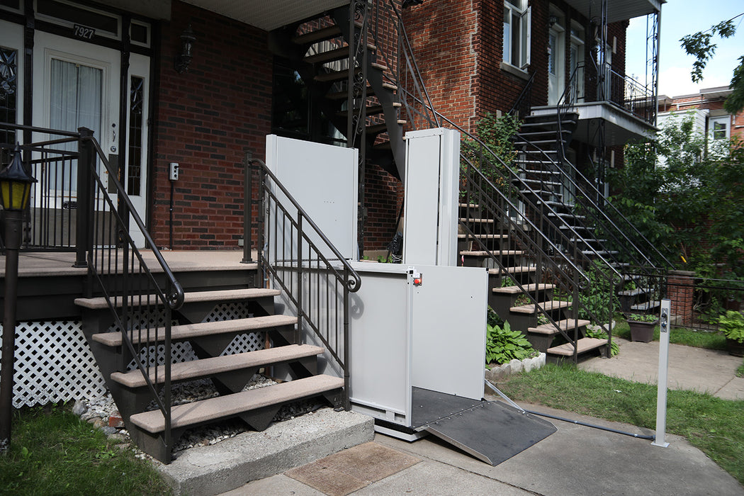 Atlas Nano Vertical Platform Lift Providing Easy Ground Level Entry In A Lowered Position