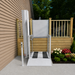 An Outdoor Residential Atlas Nano Vertical Platform Lift Installed Next To A Porch Wood Deck Alignment With A Concrete Landing Pad.