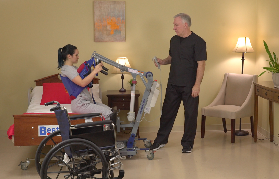 Bestcare BestStand ProCare SA400 Sit to Stand Lift With Caregiver And Patient  Wheelchair To Bed Transfer