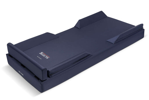 Emerald Raised Perimeter Mattress Cover In Dark Blue Nylon With Fully Enclosed Zipper Option And Built-in Foam Side Safety Bolsters For Patient Fall Prevention.