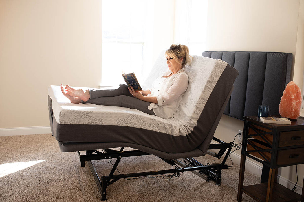 Flex A Bed Hi Low Adjustable Bed Queen Size In Fully Raised Head And Knee Section With Headboard And User In The Bed Side View