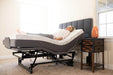 Flex A Bed Hi Low Adjustable Bed Queen Size In Raised Head And Knee Section With Headboard And User In The Bed Side View