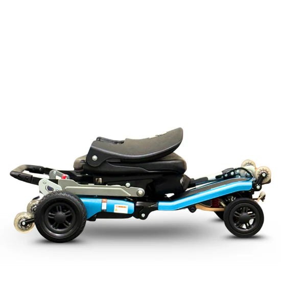 FreeRider Luggie Super Plus 4 Travel Mobility Scooter Compact Foldable Lightweight Scooter Main Image On the Floor Folded Photo
