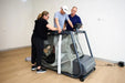 GoldenAll Aero Runner Anti-Gravity Treadmill for Rehabilitation, Gait Analysis and Body Weight Support Training Sample Photo Assisting the User