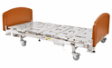 Graham Field Liberty Care Bed Featuring Antimicrobial Surface Protection, Secure Locking Casters, and Low Height  Lower Position Image