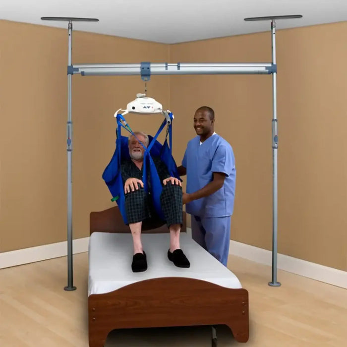 Handicare 4-Post Gantry Free Standing Patient Lifting System For Flexible Patient Transfers With 286–1200 Lb Weight Capacity Showing Bed Transfer
