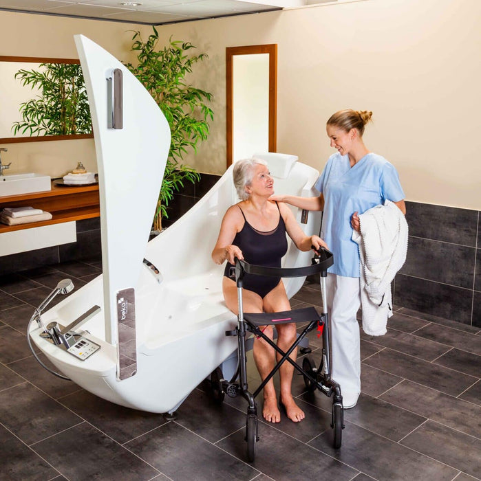 Handicare AVERO Motion Bathtub With Height-Adjustable, Wheelchair-Accessible Assisted Bathing System For Safe, Ergonomic Care In Facility Setting