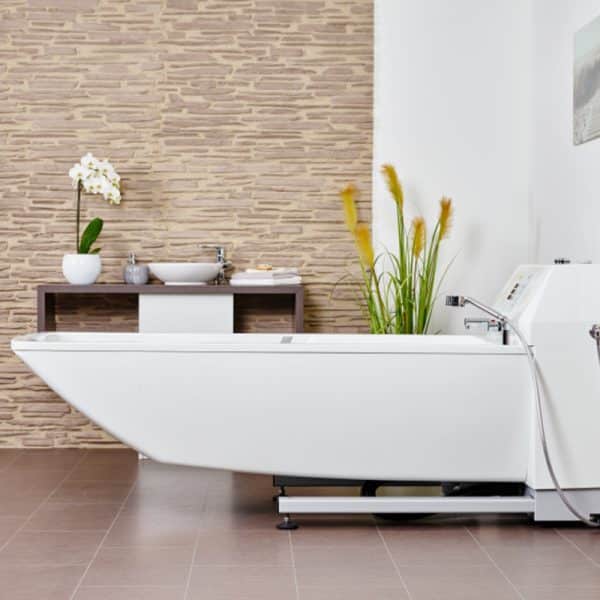 Handicare AVERO Premium Plus Bathtub Featuring Height-Adjustable, Wheelchair Accessible Care Bathtub And Universal Bath Lift Compatibility In Side View