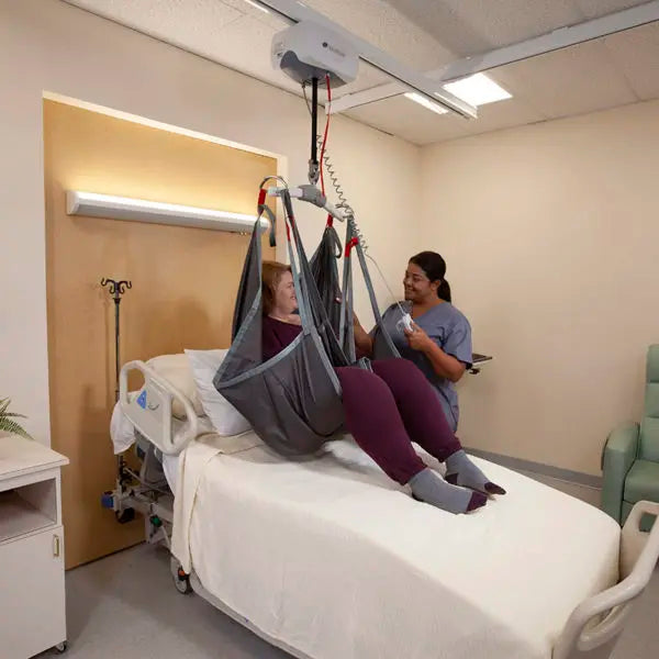 Handicare Bariatric Ceiling Lift Manual Traverse With 1000 lb Capacity For Safe Bariatric Patient Transfers To Bed