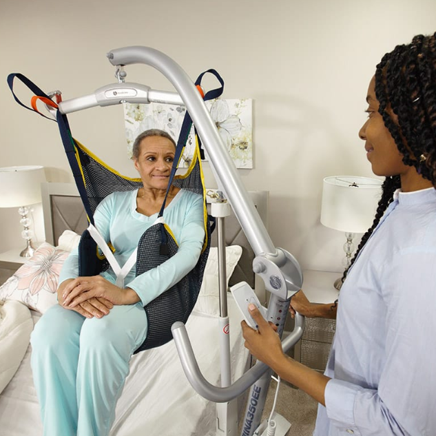 Handicare Carina 350 Mobile Patient Lift Featuring A Compact Foldable Design for Safe Patient Transfers With 350 Lb Capacity In Long Term Care Setting