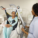 Handicare Carina 350 Mobile Patient Lift Featuring A Compact Foldable Design for Safe Patient Transfers With 350 Lb Capacity In Long Term Care Setting