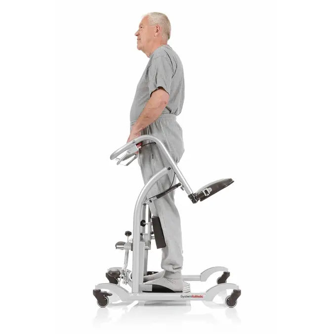 Handicare QuickMove Sit-to-Stand Aid For Patient Transfers With Up To 375 Lb Capacity Featuring Patient Standing On Lift