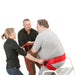 Handicare ReTurn 7600 Sit-to-Stand Patient Lift 450 lb Capacity Transfer Device For Bariatric Support With Patient Using Lift Assisted By Caregivers