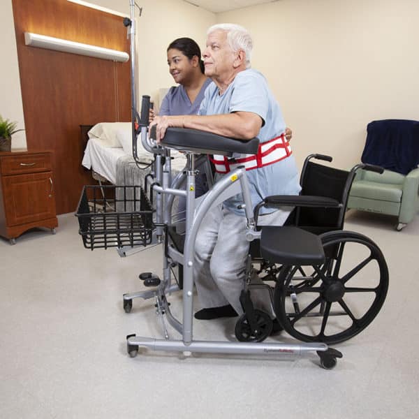 Handicare RoWalker 400 Walking Aid For Stability Support With 400 Cb Capacity In Use By A Patient With Caregiver Assist