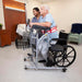 Handicare RoWalker 400 Walking Aid For Stability Support With 400 Cb Capacity In Use By A Patient With Caregiver Assist