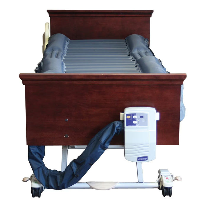 Joerns DermaFloat APL Alternating Pressure Mattress In Fully Flat Bed Frame With Air Cells And Air Pump Mounted To Bed View
