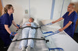 Joerns Mangar Swift With Patient Assisted By Caregiver Bed Transfer View
