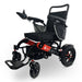 ComfyGO MAJESTIC IQ-7000 Auto Folding Electric Wheelchair Lightweight, Airline-Friendly, and Travel Ready with joystick controller mounted on the right armrest and sleek black frame