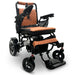 Taba ComfyGO MAJESTIC IQ-7000 Auto Folding Electric Wheelchair Lightweight, Airline-Friendly, and Travel Ready with premium quilted taba seat and backrest with gold stitching and joystick controller is mounted on the right armrest
