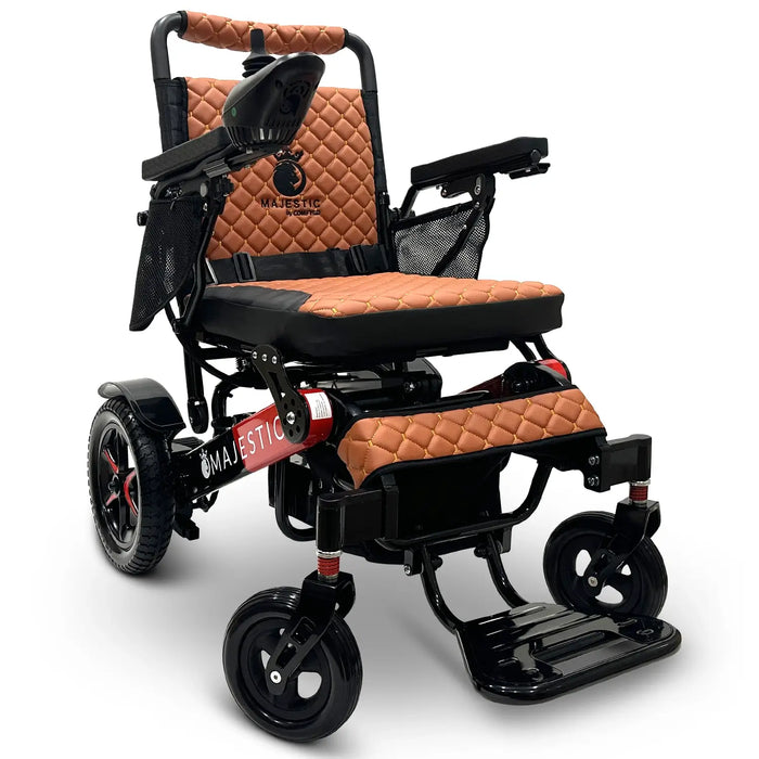 Black/Red Frame Taba Textile ComfyGO MAJESTIC IQ-7000 Auto Folding Electric Wheelchair Lightweight, Airline-Friendly, and Travel Ready with premium quilted taba seat and backrest with gold stitching and joystick controller is mounted on the right armrest