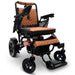 Black/Red Frame Taba Textile ComfyGO MAJESTIC IQ-7000 Auto Folding Electric Wheelchair Lightweight, Airline-Friendly, and Travel Ready with premium quilted taba seat and backrest with gold stitching and joystick controller is mounted on the right armrest