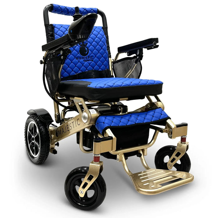 Bronze Frame and Blue Textile ComfyGO MAJESTIC IQ-7000 Auto Folding Electric Wheelchair Lightweight, Airline-Friendly, and Travel Ready with premium quilted blue seat and backrest with gold stitching and joystick controller is mounted on the right armrest