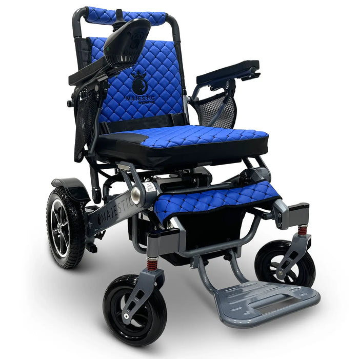 Silver Frame Blue Textile ComfyGO MAJESTIC IQ-7000 Auto Folding Electric Wheelchair Lightweight, Airline-Friendly, and Travel Ready with premium quilted blue seat and backrest with black stitching and joystick controller is mounted on the right armrest
