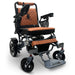 Silver Frame Taba Textile ComfyGO MAJESTIC IQ-7000 Auto Folding Electric Wheelchair Lightweight, Airline-Friendly, and Travel Ready with premium quilted taba seat and backrest with gold stitching and joystick controller is mounted on the right armrest
