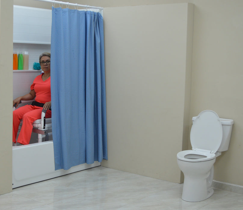 MJM-International-All-Purpose-Dual-Shower-Transfer-Chair-In-Bathroom-Setting-With-Patient-In-Bathtub-No-Bridge-View