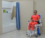 MJM International All Purpose Dual Shower Transfer Chair In Bathroom Setting With Patient View